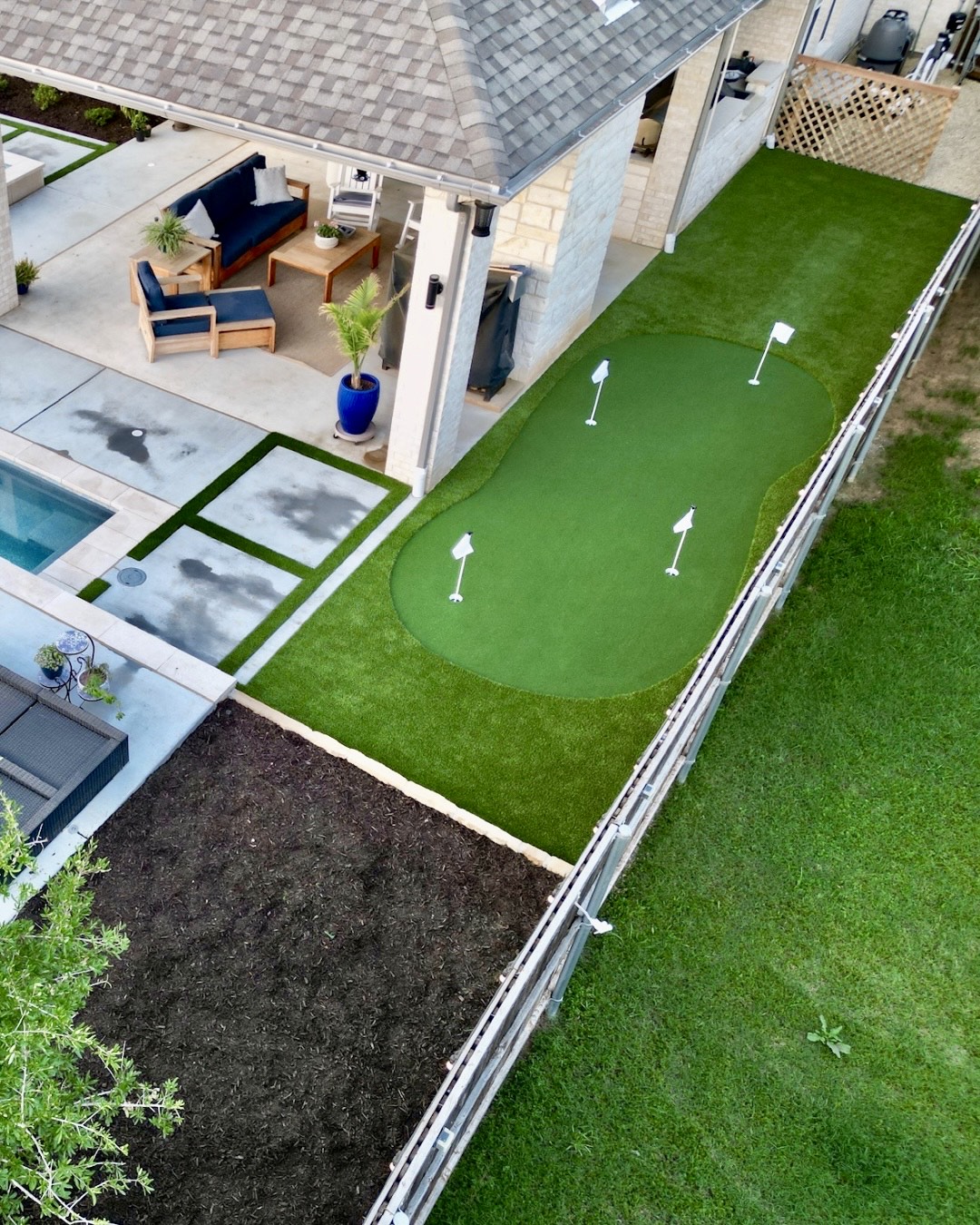 Green Meets Blue: Custom Turf & Putting Green Around New Pool in Kennedale, TX
